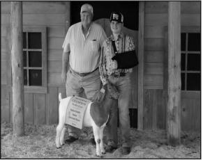 Owner: Kamden Snow Premium Buyer: Elder Hardwood, Waxman Consultants, Rural Pipe &amp; Supply Reserve Champion Goat
